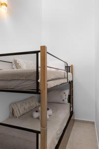Ένα ή περισσότερα κρεβάτια σε δωμάτιο στο VaSteka House 2