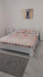 Postel nebo postele na pokoji v ubytování Apartmani Miletić