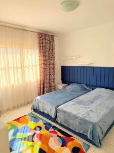 Ένα ή περισσότερα κρεβάτια σε δωμάτιο στο Spacious Villa Sharm El Sheikh Delta Sharm