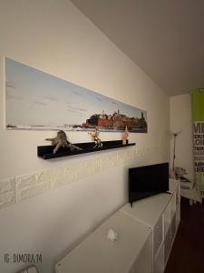 A television and/or entertainment centre at Dimora 14