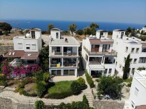 an aerial view of a house at Stunning Sea View Cosy Apartment in Gundogan