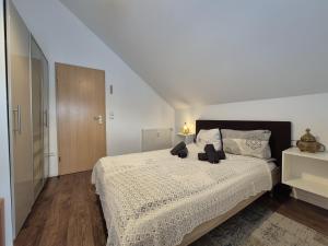 Postel nebo postele na pokoji v ubytování Mikra Homes24 in Meerane