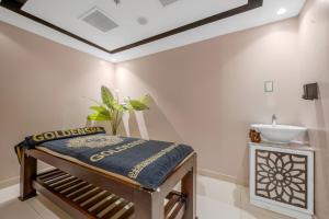 Кровать или кровати в номере Grand Oasis Resort