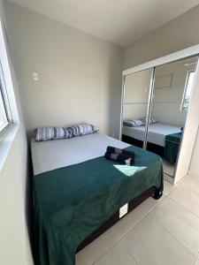 Postel nebo postele na pokoji v ubytování Apartamento em Penha próximo Beto Carrero e Praia