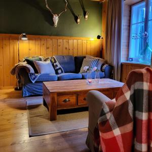 Posezení v ubytování Sachserhof Ferienwohnungen in Sachsenburg