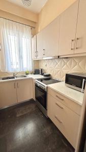 Kuchyň nebo kuchyňský kout v ubytování Seaside Nest Corinth + 8 fotografií