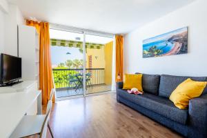 TV a/nebo společenská místnost v ubytování 32 BRIGHT COPACABANA ocean view free WiFi