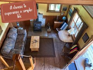 an overhead view of a living room with a sign at Maple Heart Ranch in Shawnigan Lake