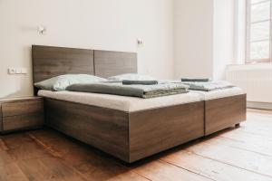 Posteľ alebo postele v izbe v ubytovaní Apartmány 511
