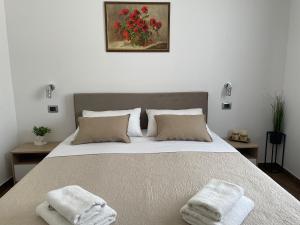 Postel nebo postele na pokoji v ubytování Apartments Anna I