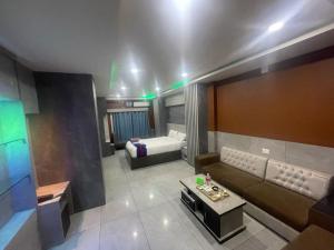 Postel nebo postele na pokoji v ubytování Hotel Ruskin PvtLtd