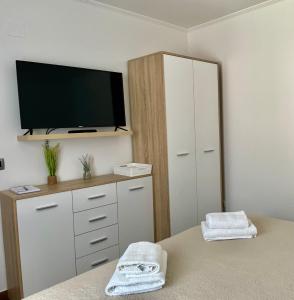 Postel nebo postele na pokoji v ubytování Apartments Anna I