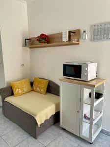 Kuchyň nebo kuchyňský kout v ubytování Apartments Anna I