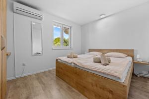 Postel nebo postele na pokoji v ubytování Villa Susanne