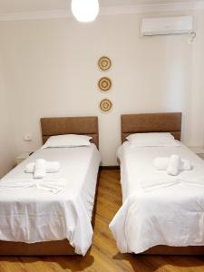 Postel nebo postele na pokoji v ubytování Villa Reve de Tirana