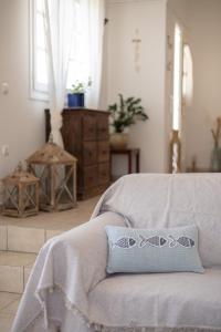 A bed or beds in a room at Cozy Sea View House