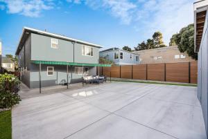 a house with a large patio in the backyard at Daly city 3B Home Great location in Daly City +23 photos