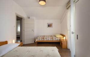 Ένα ή περισσότερα κρεβάτια σε δωμάτιο στο House Hideaway Novi Vinodolski by Villas Guide +39 φωτογραφίες