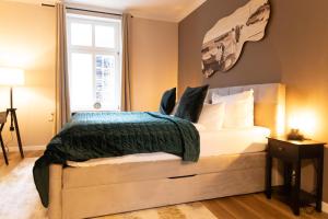 Postel nebo postele na pokoji v ubytování Hotel Garni BALTICpetite