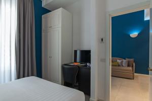 Postel nebo postele na pokoji v ubytování Boutique Hotel Metro 900