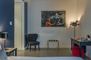 TV a/nebo společenská místnost v ubytování Boutique Hotel Metro 900