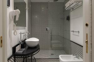 Koupelna v ubytování Boutique Hotel Metro 900