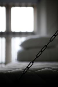 Giường trong phòng chung tại SleepIn FÆNGSLET