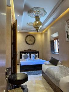 Postel nebo postele na pokoji v ubytování Riad Alice Terrace & Spa