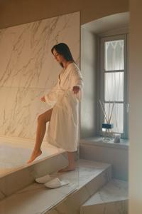 Hostia v ubytovaní REGO APARTMENTS - Boutique Aparthotel & Serenity Spa with some off-site apartments in the Heart of Bergamo City Center