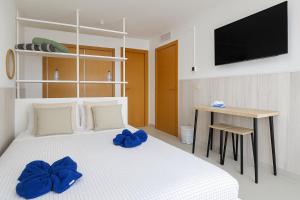Postel nebo postele na pokoji v ubytování Habitación en ático dúplex