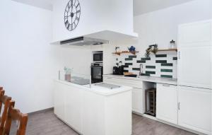 Η κουζίνα ή μικρή κουζίνα στο Authentique Maison Vue Mer