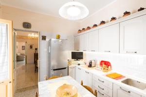 A kitchen or kitchenette at Casa vacanza Nonna Emma