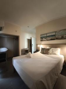 En eller flere senger på et rom på Hotel Sao Mamede Estoril