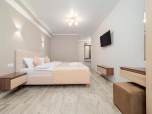 Postel nebo postele na pokoji v ubytování Hotel Paris