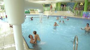 a group of people in a swimming pool at Riverside 24 - Haggerston Castle in Berwick-Upon-Tweed