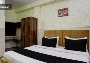 Postel nebo postele na pokoji v ubytování Hotel Vista 18 Inn Couple Friendly