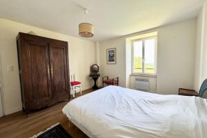 Postel nebo postele na pokoji v ubytování Maison familiale vue mer douceur à Clohars