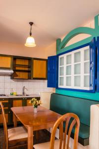 Kuchyň nebo kuchyňský kout v ubytování Limanaki Apartments + 9 fotografií