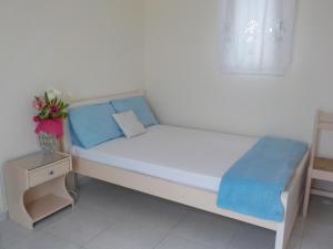 A bed or beds in a room at Mini City Center Studio
