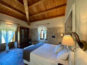 Postel nebo postele na pokoji v ubytování La quercia B&B