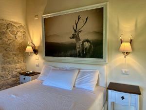 Postel nebo postele na pokoji v ubytování La quercia B&B