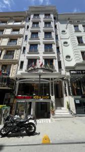 a motorcycle parked in front of a hotel at Hotel Bulvar Istanbul in Istanbul