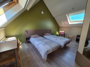 Postel nebo postele na pokoji v ubytování B&B Tlekkerbeddeke