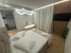 TV a/nebo společenská místnost v ubytování Hotel Parid