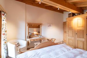 Ένα ή περισσότερα κρεβάτια σε δωμάτιο στο Edelweiss Casa Miez Penthouse