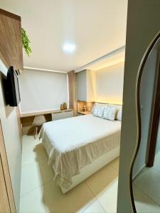 Voodi või voodid majutusasutuse Flat decorado com vista mar- 502 Conforto para ate 6 pessoas toas