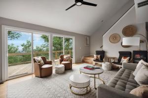 a living room with a couch and chairs at Valley Views Hot Tub Deck Screened Porch & WiFi in Hedgesville