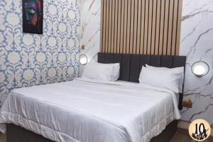 Letto o letti in una camera di 10 Kobo Hotel & Suites