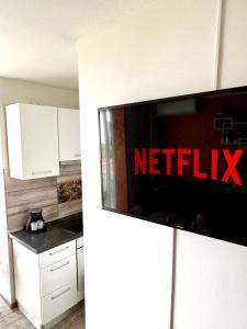 Kuchyňa alebo kuchynka v ubytovaní Luxury Apartman ASIA Rijeka