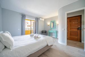 Bellavista Avenida By BeGuest客房内的一张或多张床位